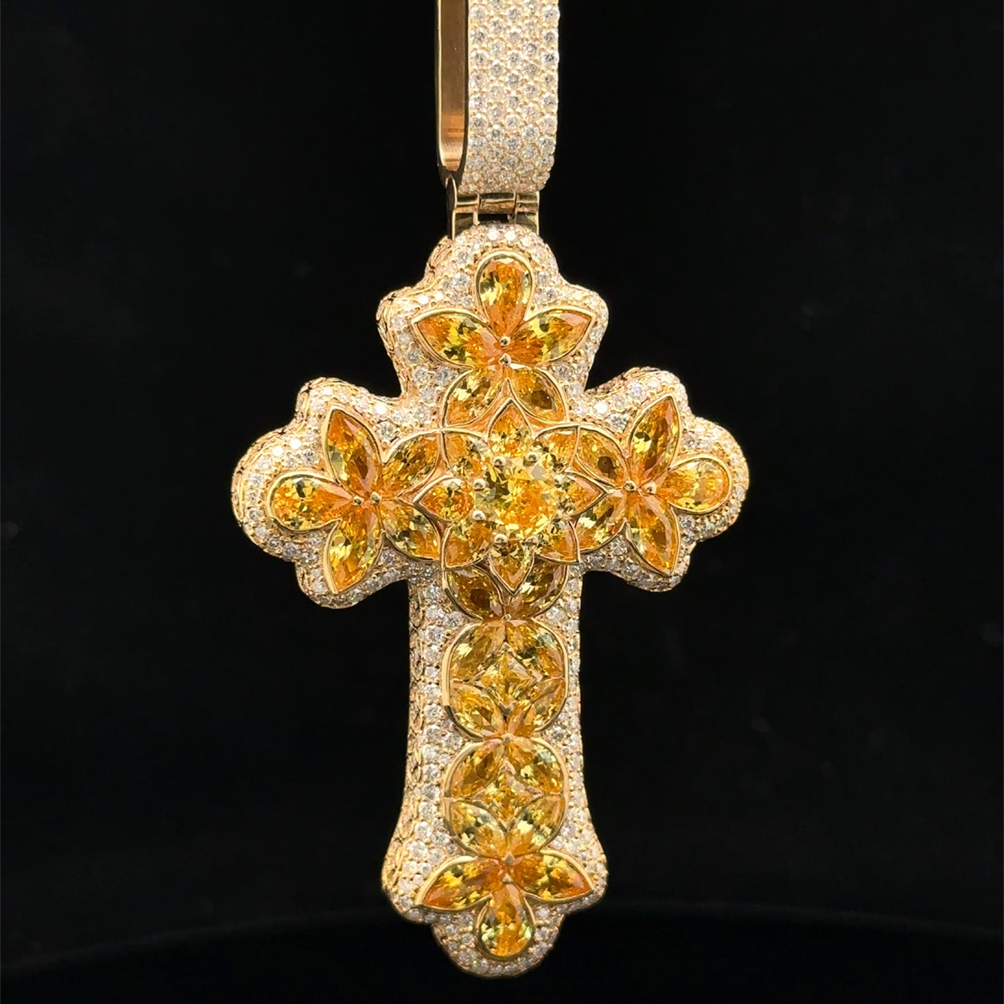 14k yellow gold and 5ct diamond Cross Pendant with round diamonds and yellow stones.