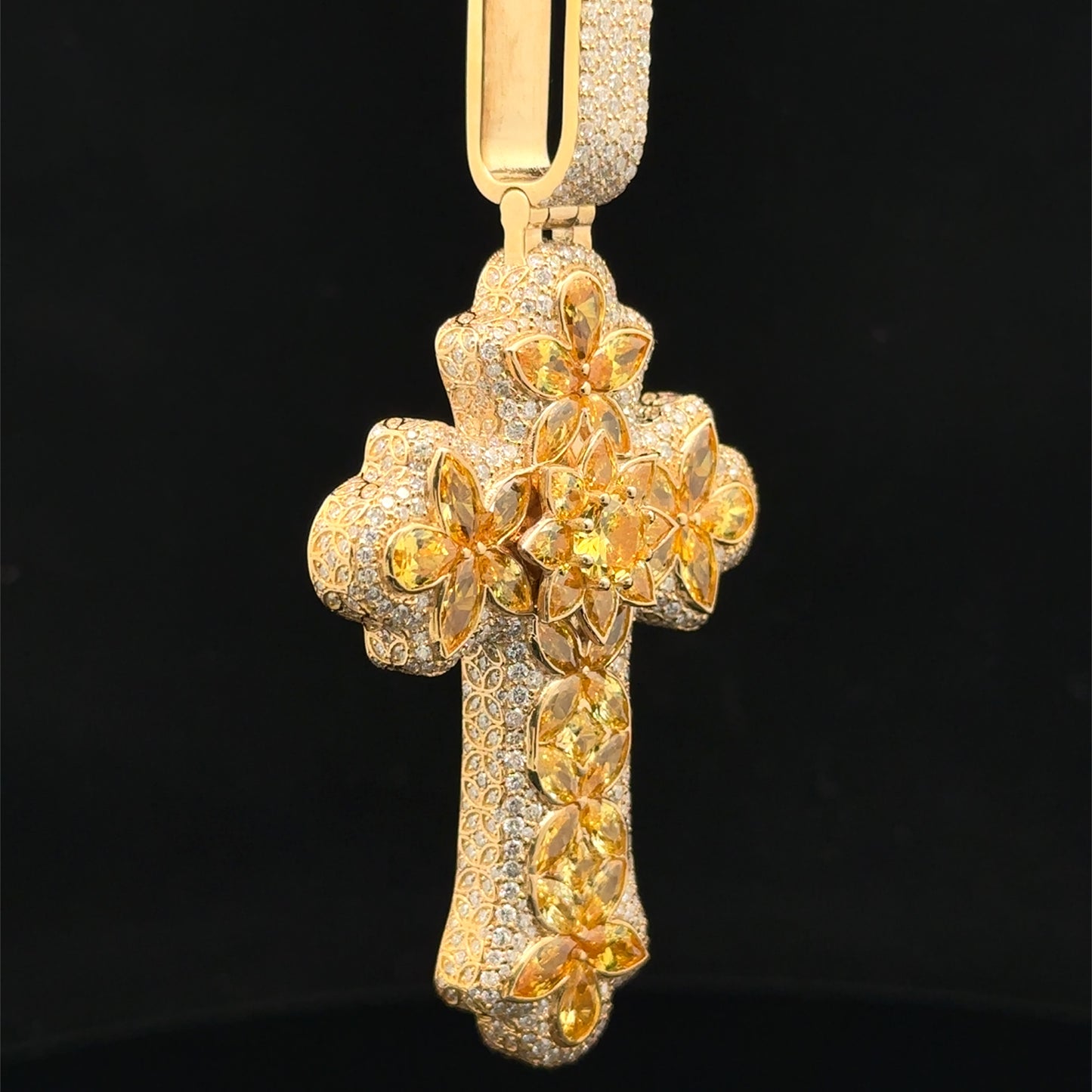14k yellow gold and 5ct diamond Cross Pendant with round diamonds and yellow stones.