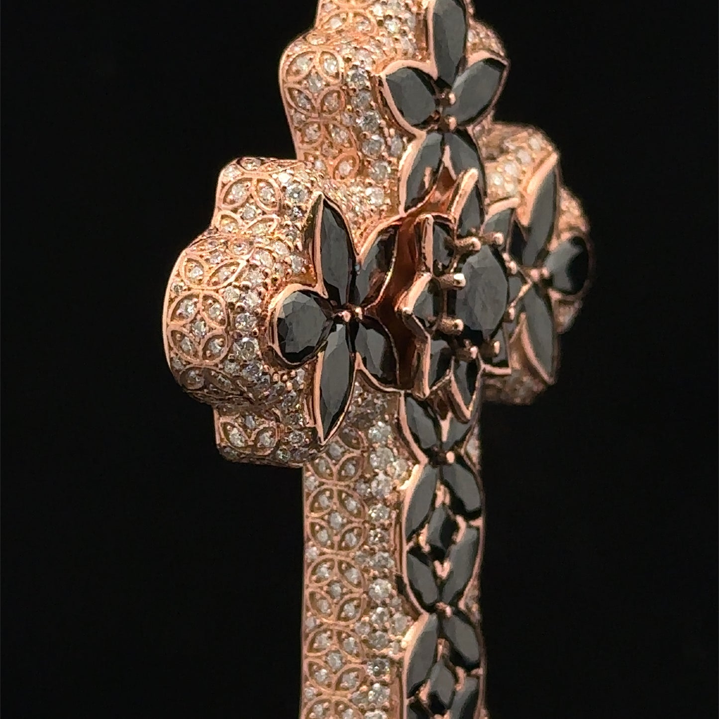 Rose gold and 5ct diamond Cross Pendant with round diamonds and black stones.