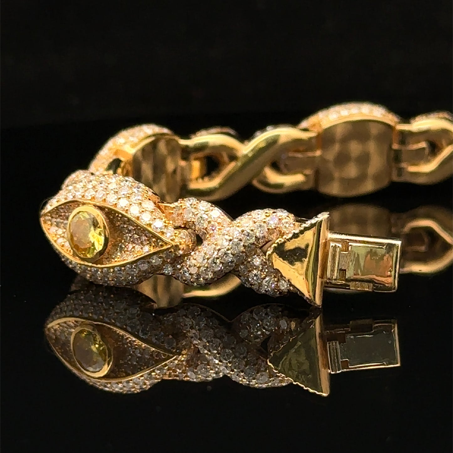 Yellow Gold and Diamond Evil Eye Bracelet with round diamonds and yellow stones