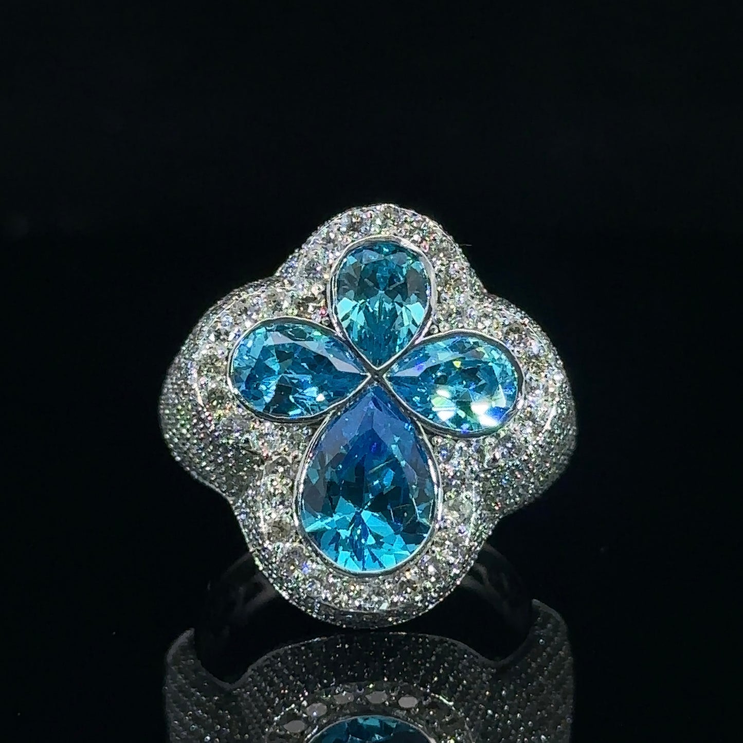 White gold and diamond Cross Ring with Blue Fancy Pear Cut Gem Stones