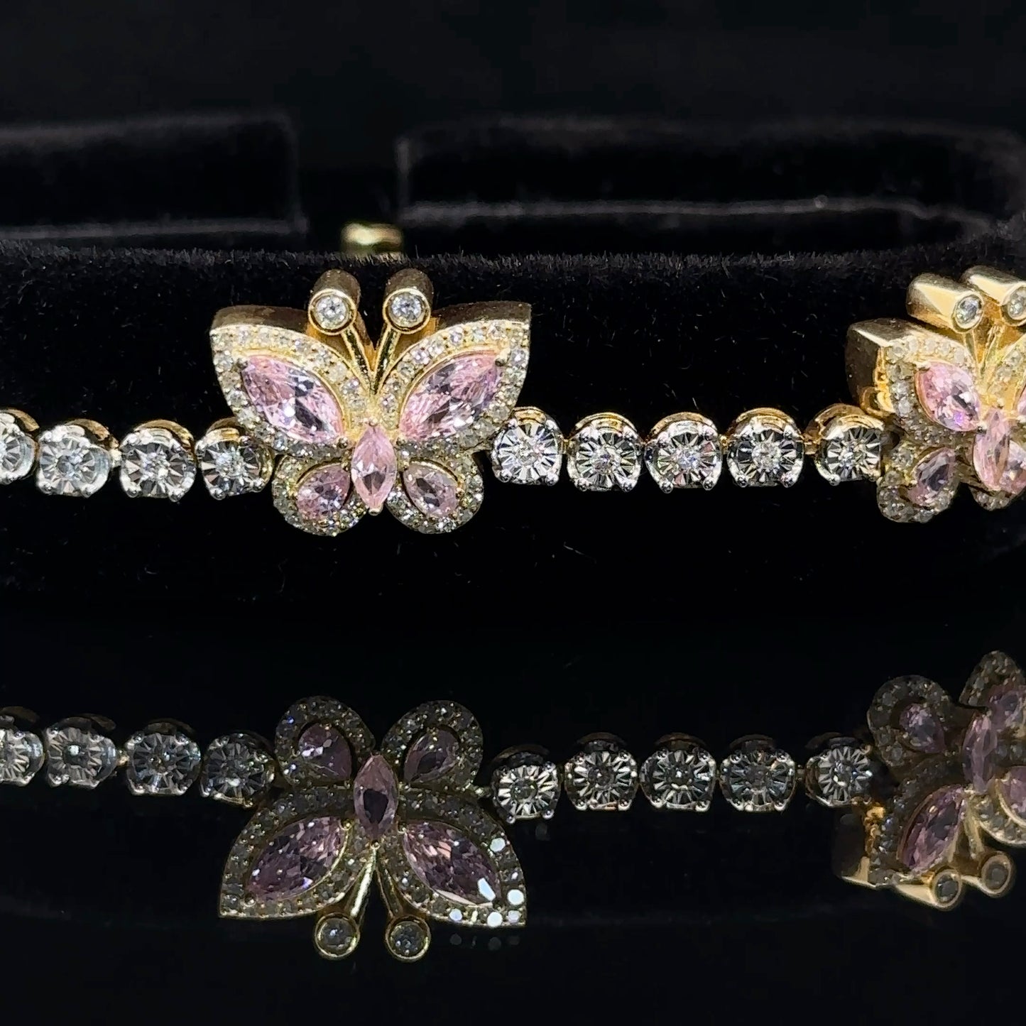 yellow gold and diamond Tennis Bracelet with butterfly insignia and Multicolored Stones