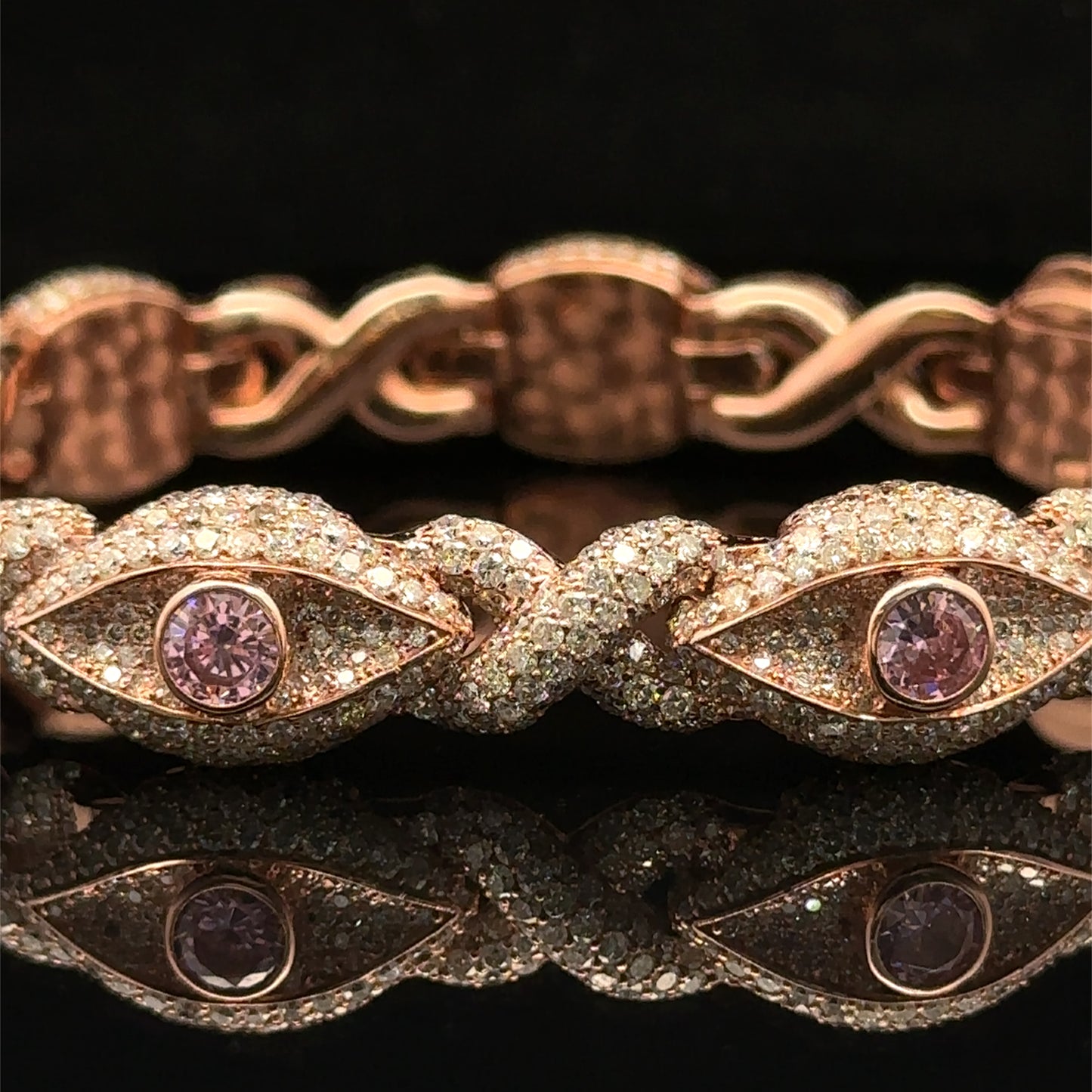 Rose Gold and Diamond Evil Eye Bracelet with round diamonds and pink stones