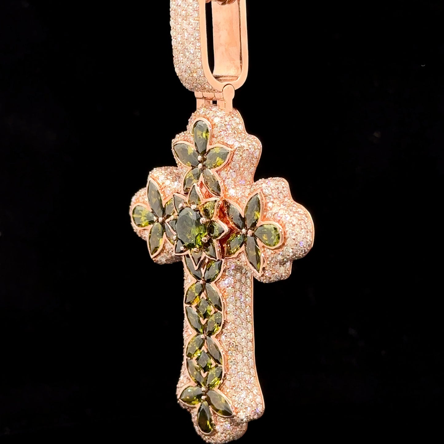 Rose gold and 7.55ct diamond Cross Pendant with round diamonds and green stones.