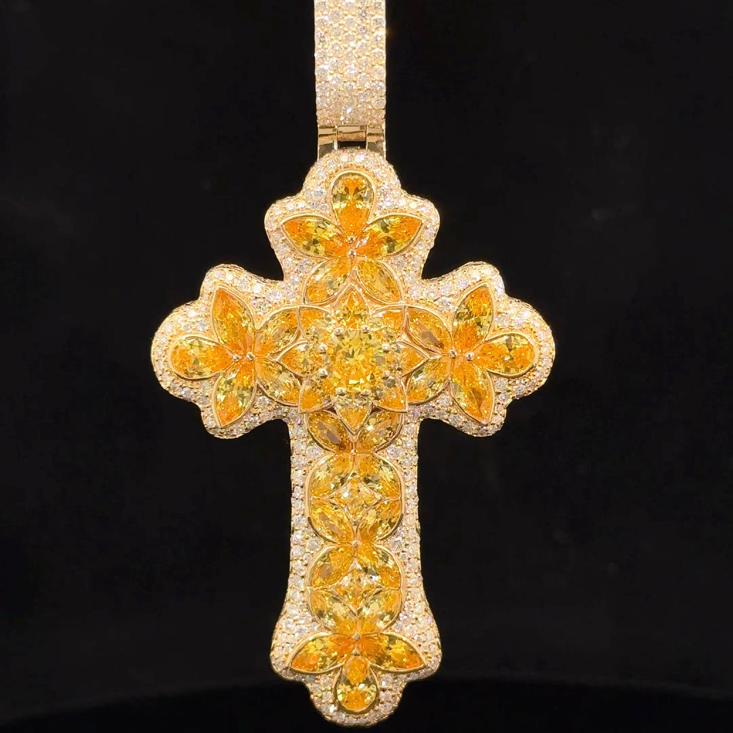 14k yellow gold and 5ct diamond Cross Pendant with round diamonds and yellow stones.