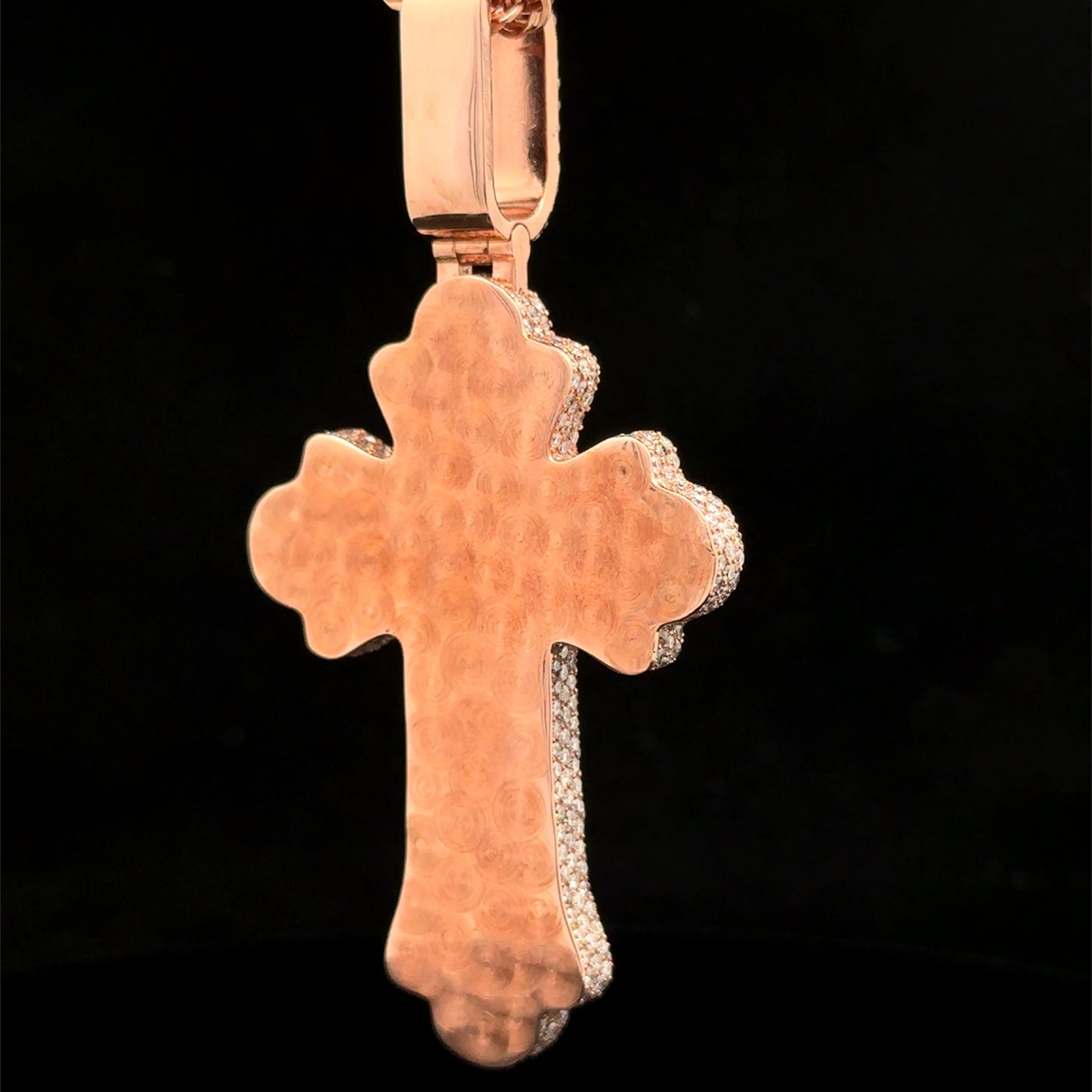 Rose gold and 7.55ct diamond Cross Pendant with round diamonds and green stones.