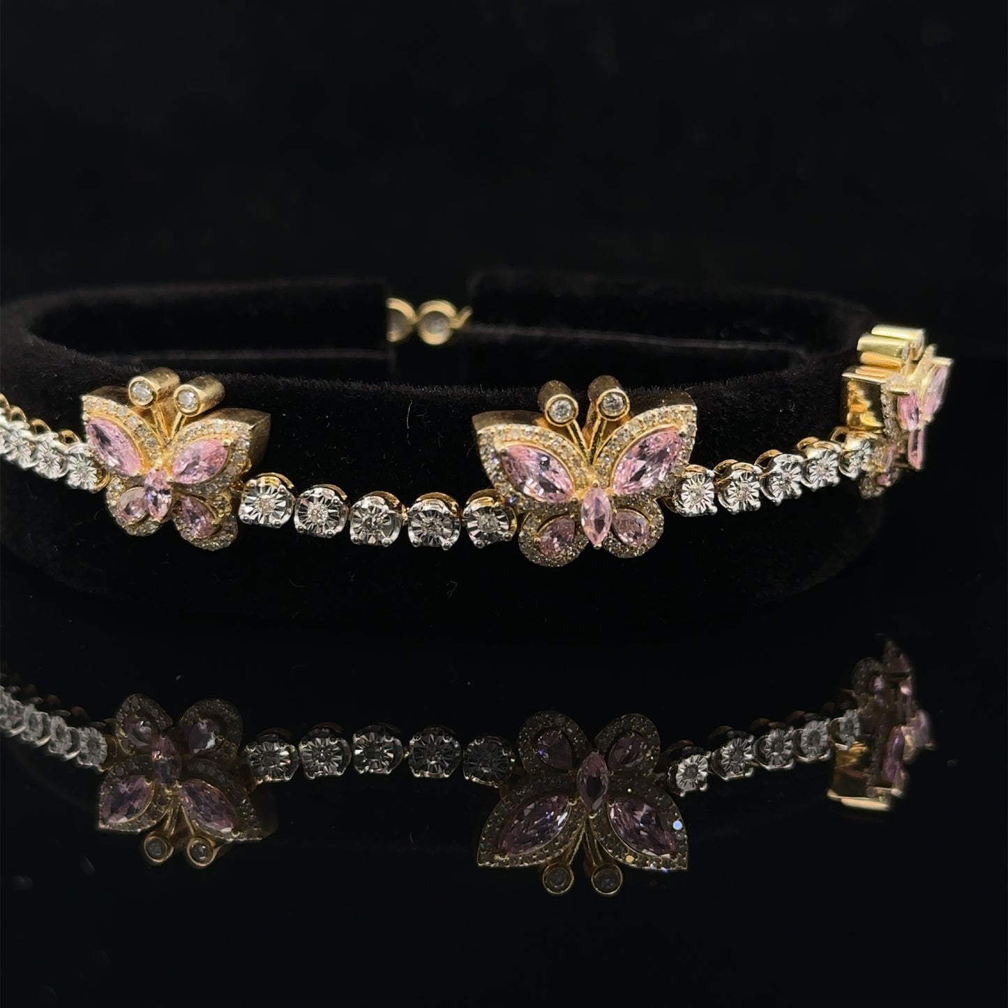 yellow gold and diamond Tennis Bracelet with butterfly insignia and Multicolored Stones