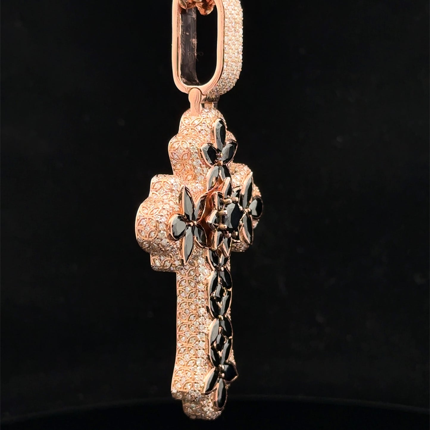 Rose gold and 5ct diamond Cross Pendant with round diamonds and black stones.