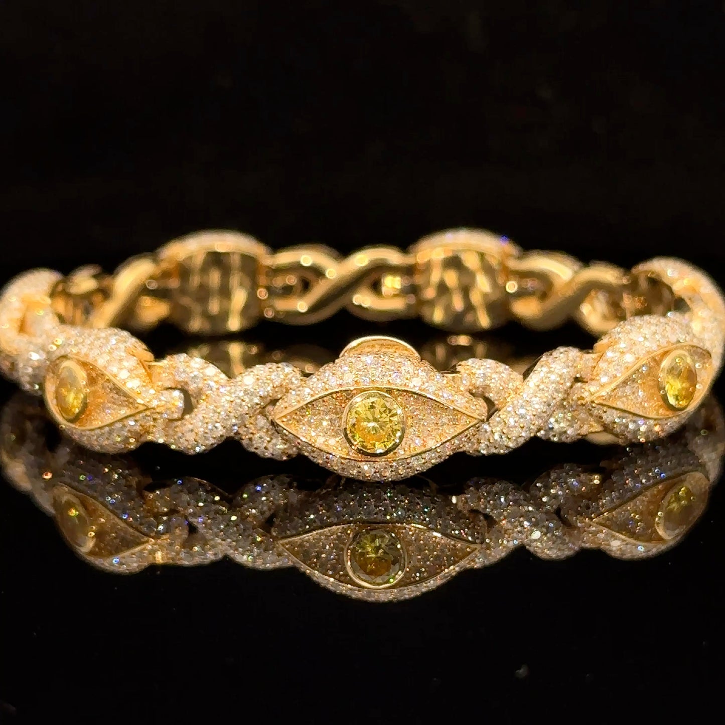 Yellow Gold and Diamond Evil Eye Bracelet with round diamonds and yellow stones