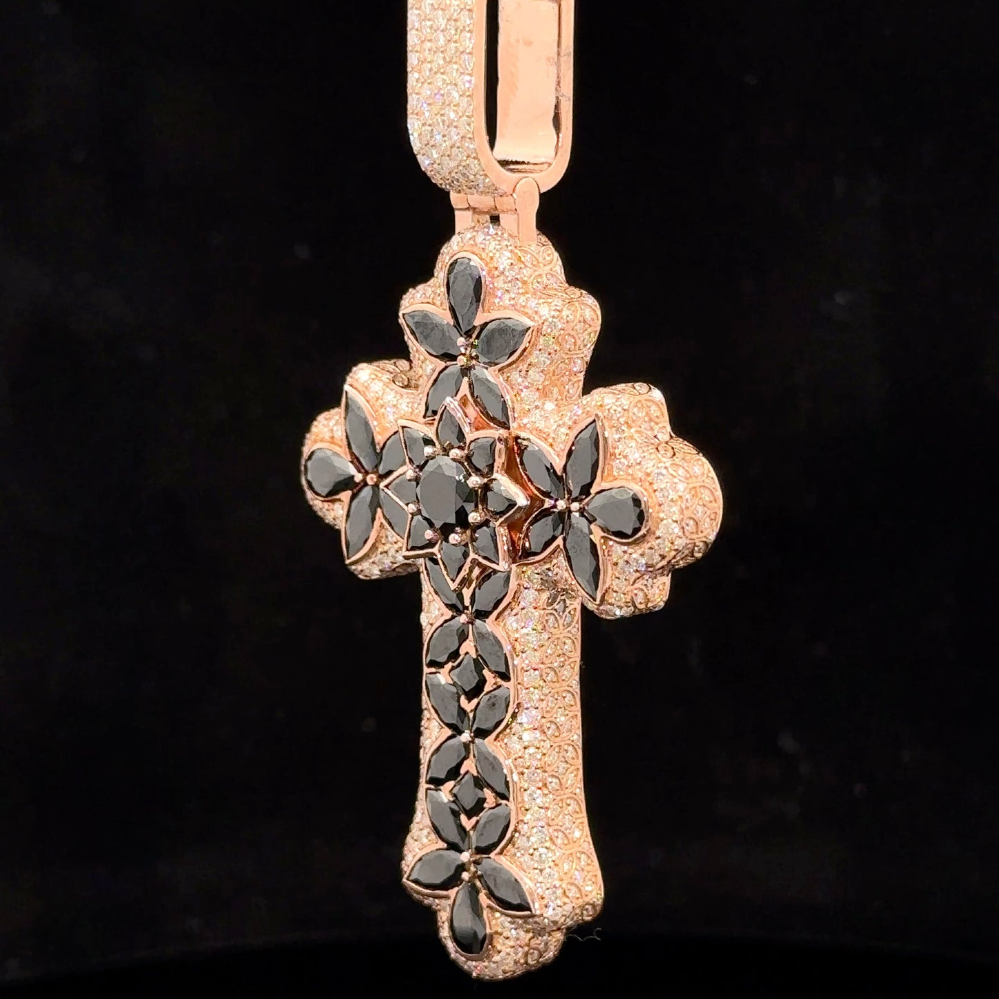 Rose gold and 5ct diamond Cross Pendant with round diamonds and black stones.