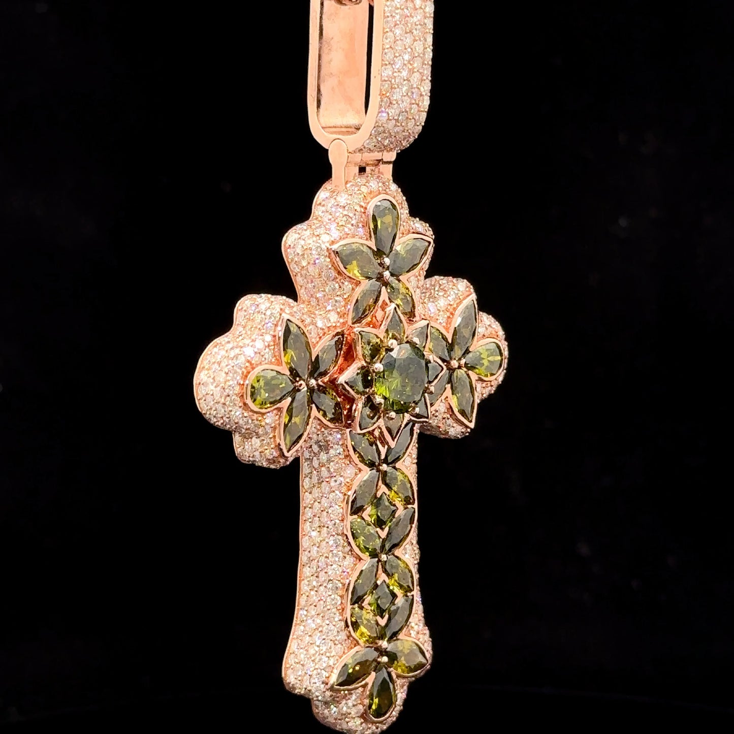 Rose gold and 7.55ct diamond Cross Pendant with round diamonds and green stones.