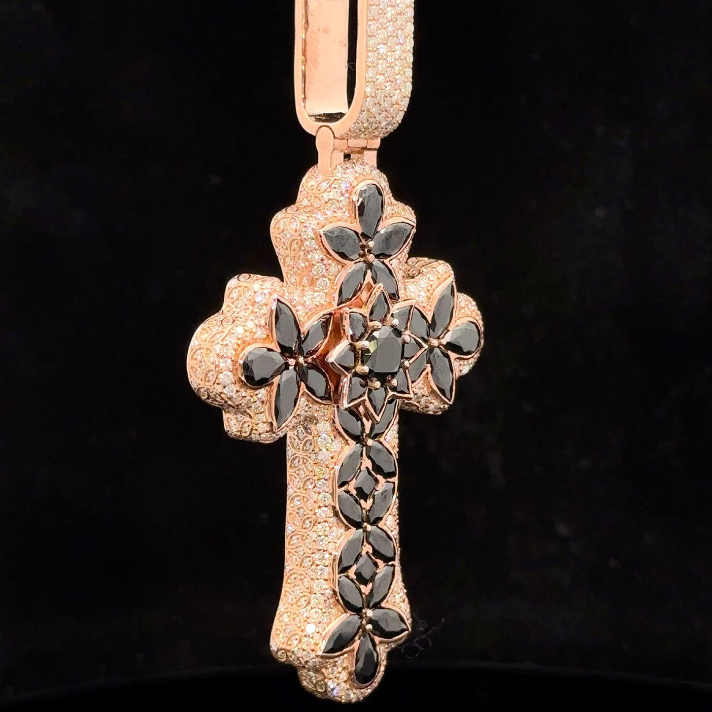 Rose gold and 5ct diamond Cross Pendant with round diamonds and black stones.