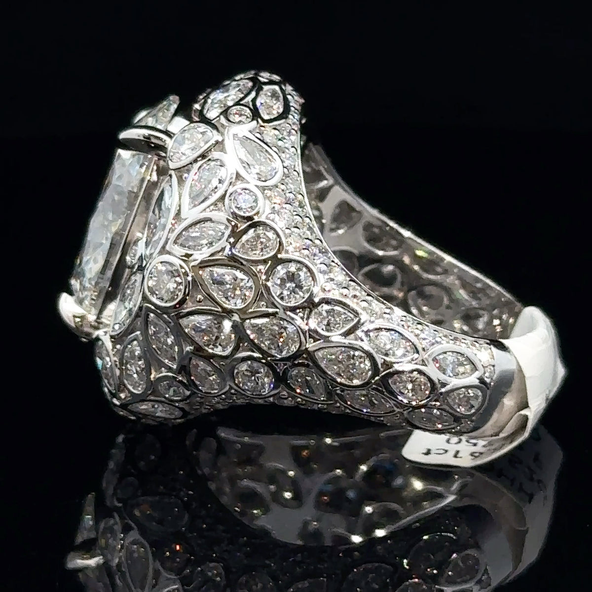White Gold and Fancy Cut Diamond Ring With Oval Center
