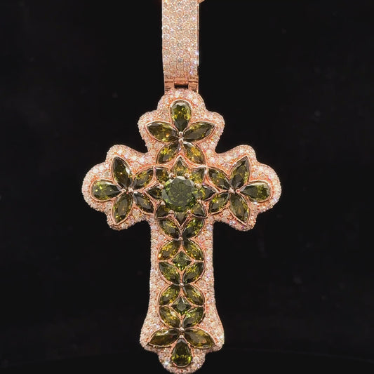 Rose gold and 7.55ct diamond Cross Pendant with round diamonds and green stones.