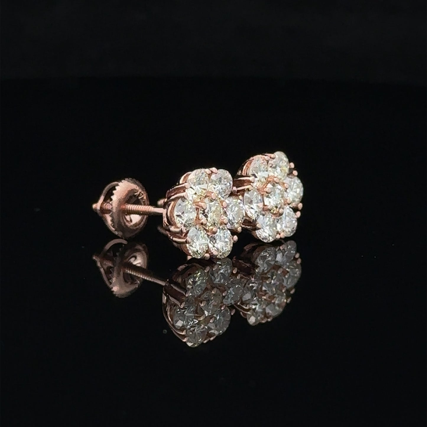 14k rose gold and diamond flower Earrings (13 pointer)