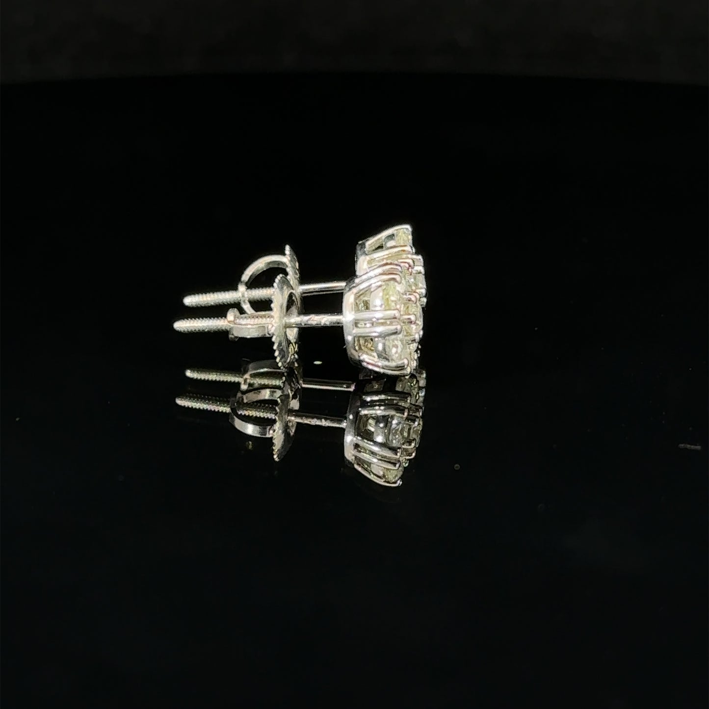 14k white gold and diamond flower Earrings (7 pointer)