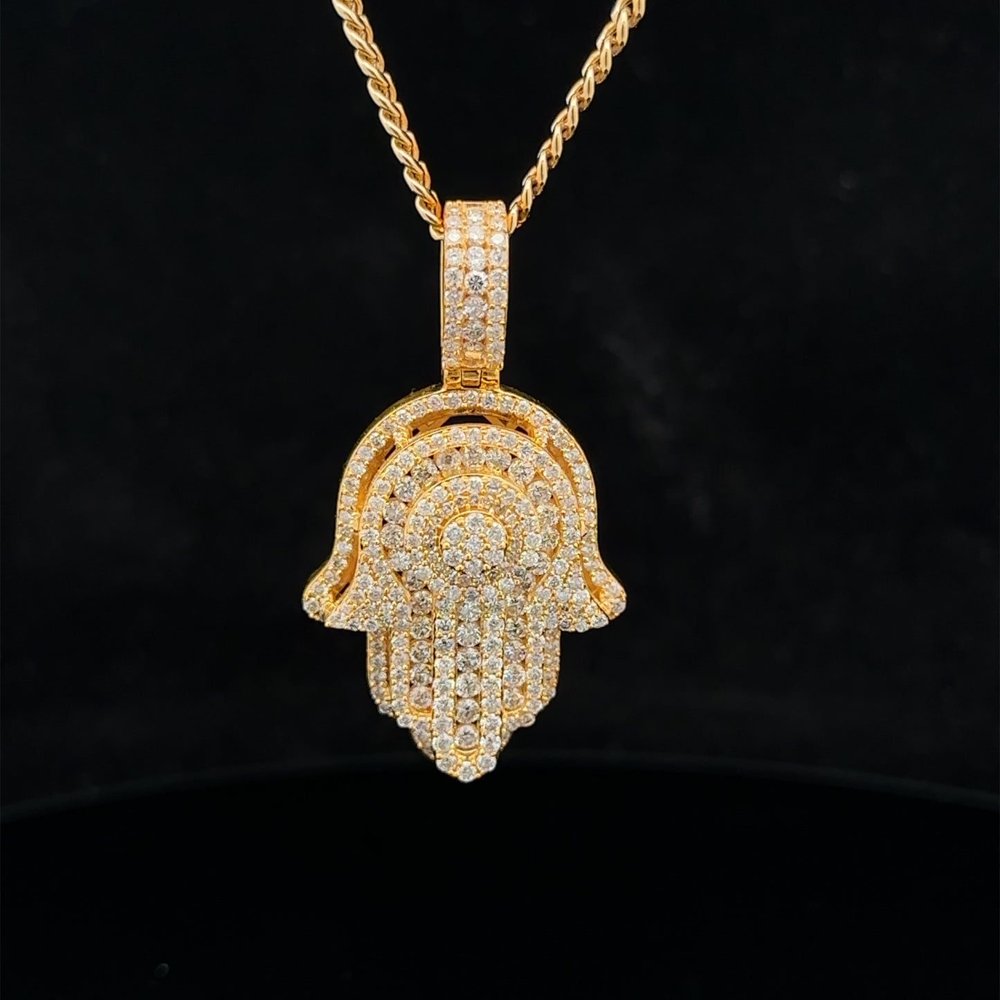 14k yellow gold and diamond Hamsa pendant and 14k yellow gold cuban link chain