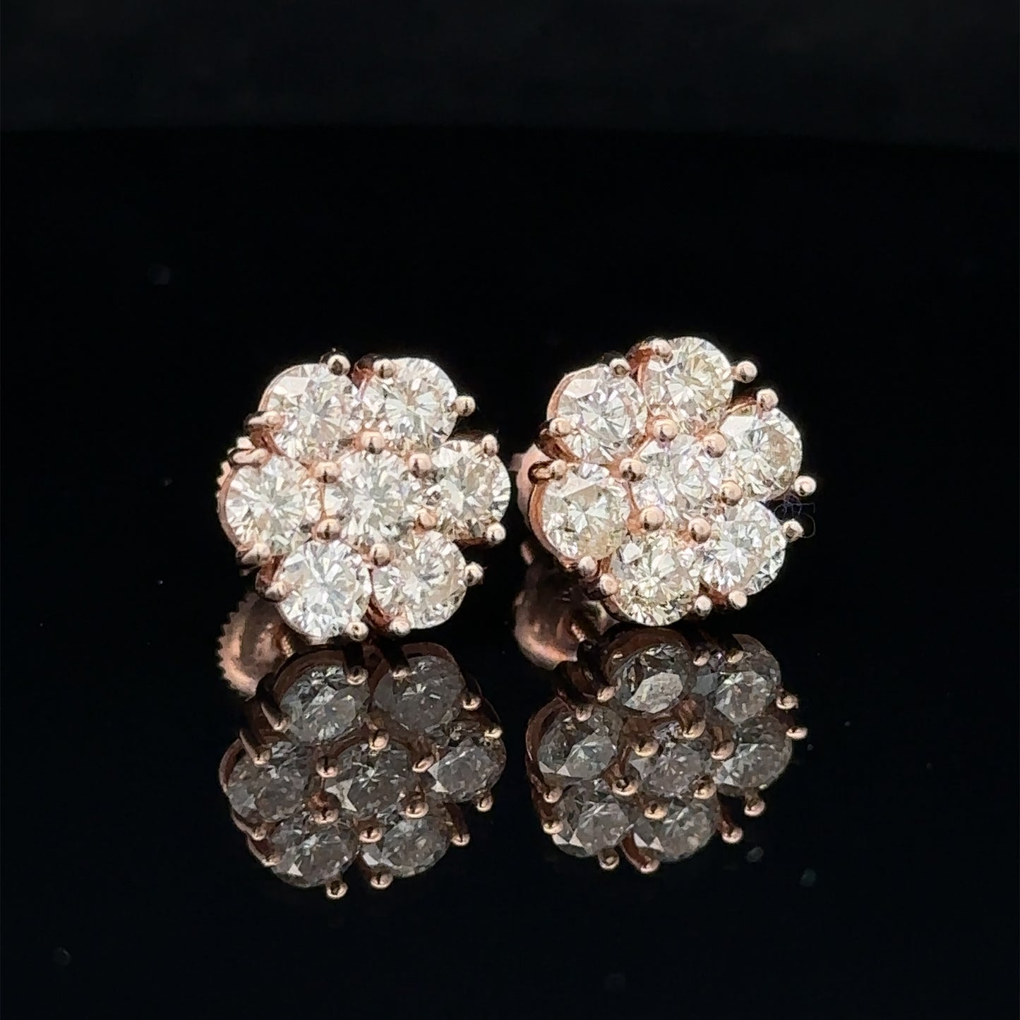 14k rose gold and diamond flower Earrings (20 pointer)