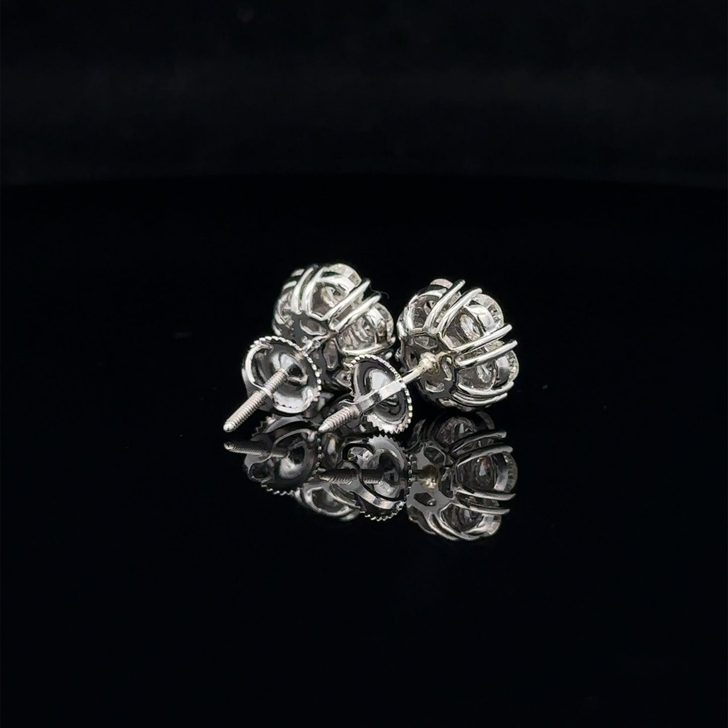 14k white gold and diamond flower Earrings (14 pointer)