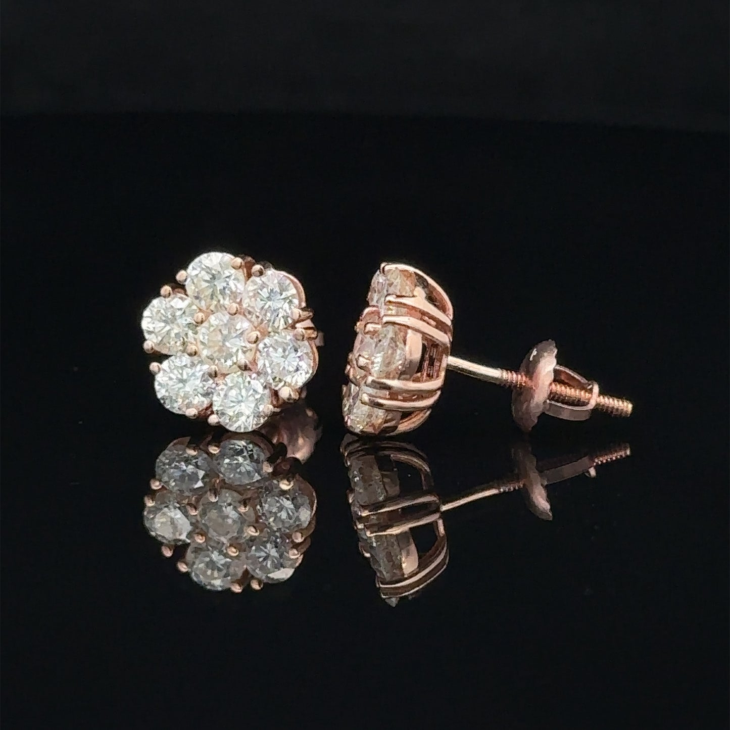 14k rose gold and diamond flower Earrings (15 pointer)