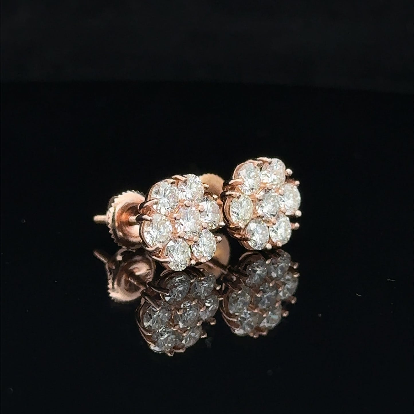 14k rose gold and diamond flower Earrings (14 pointer)