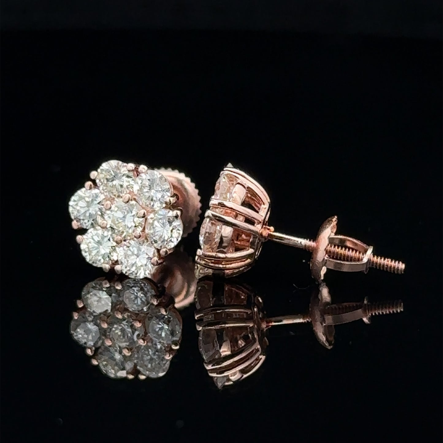 14k rose gold and diamond flower Earrings (13 pointer)