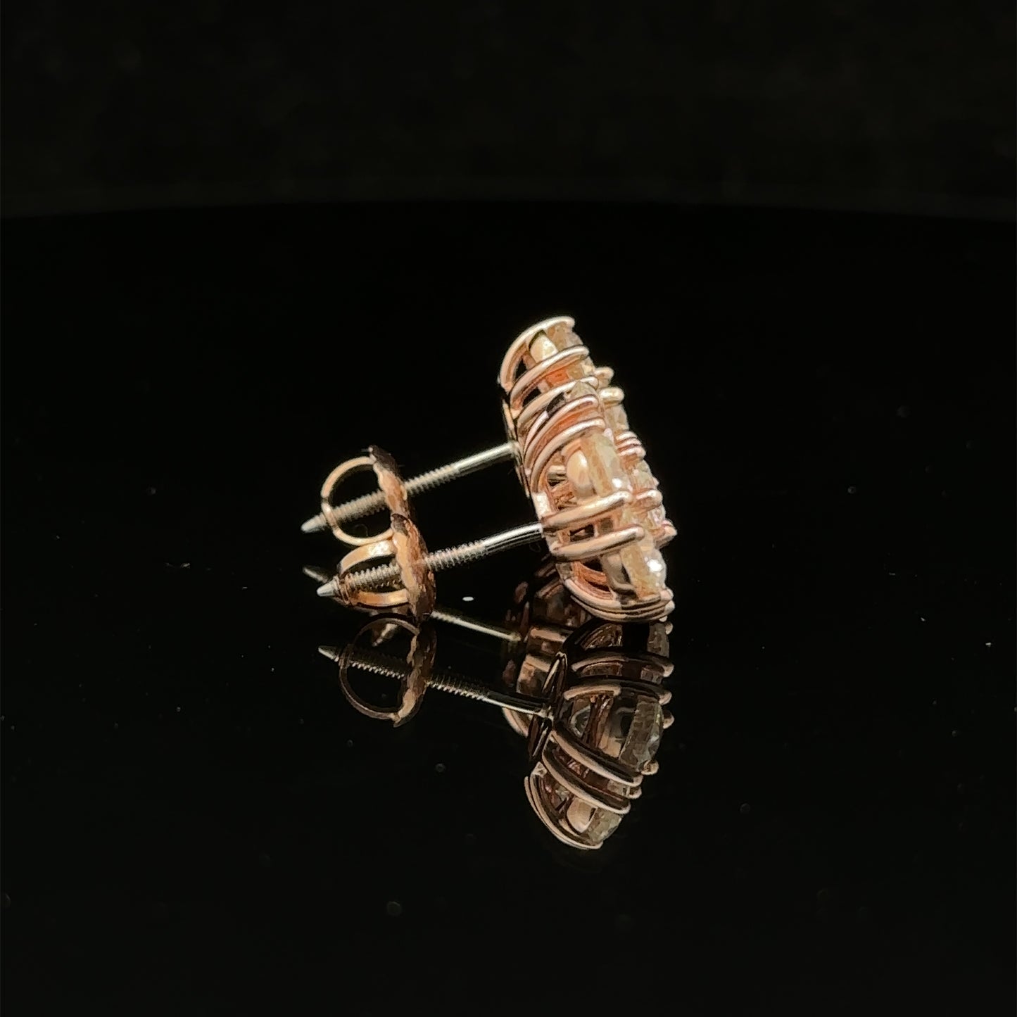 14k rose gold and diamond Earrings (25 pointer)