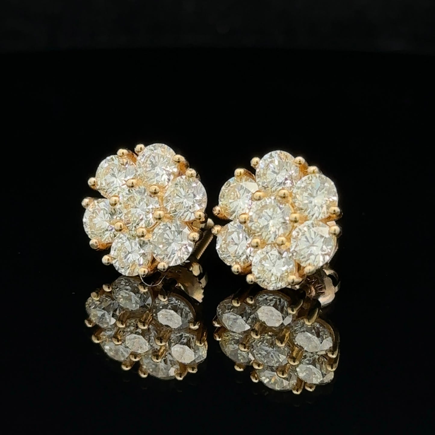 14k yellow gold and diamond flower Earrings (25 pointer)