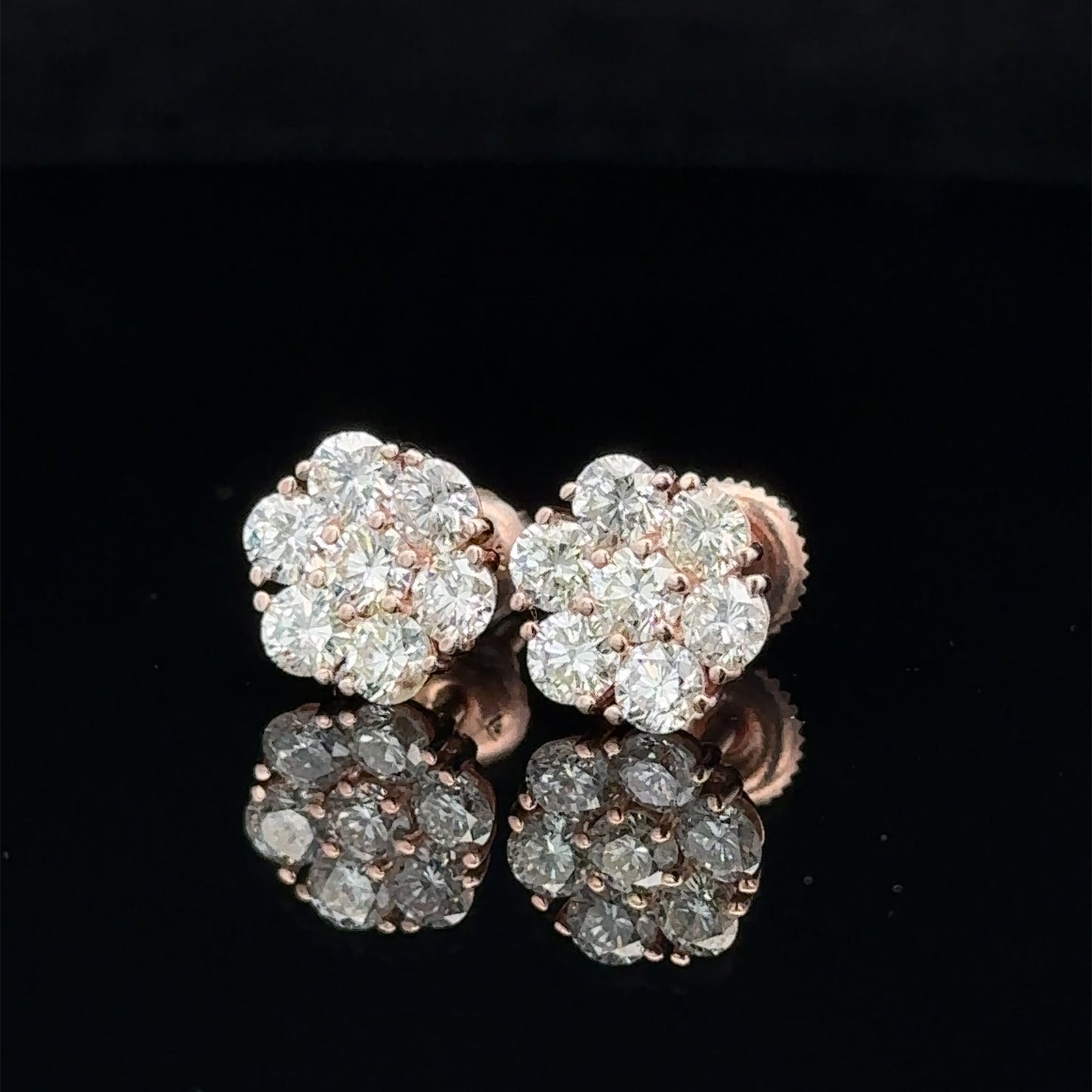 14k rose gold and diamond flower Earrings (13 pointer)