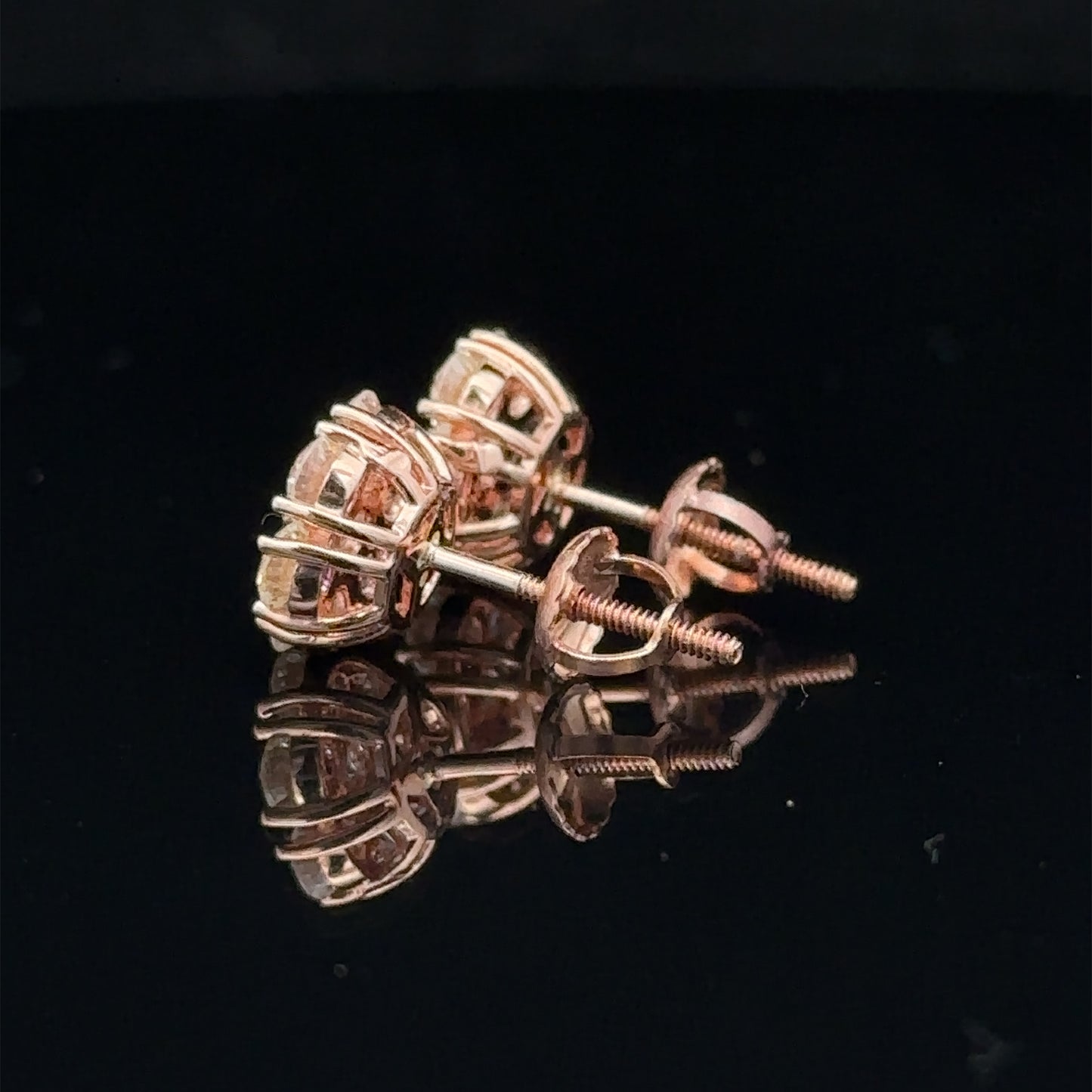 14k rose gold and diamond flower Earrings (12 pointer)