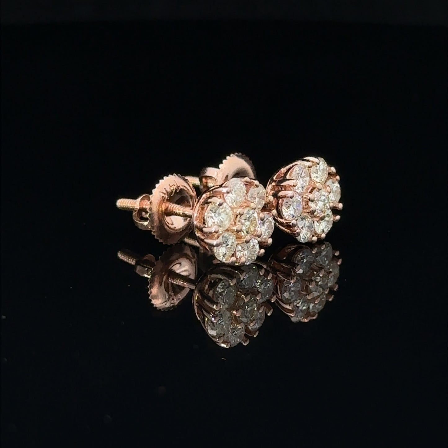 14k rose gold and diamond Flower Earrings (7 pointer)