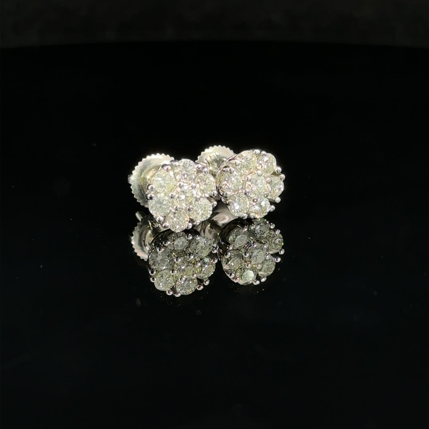 14k white gold and diamond flower Earrings (7 pointer)