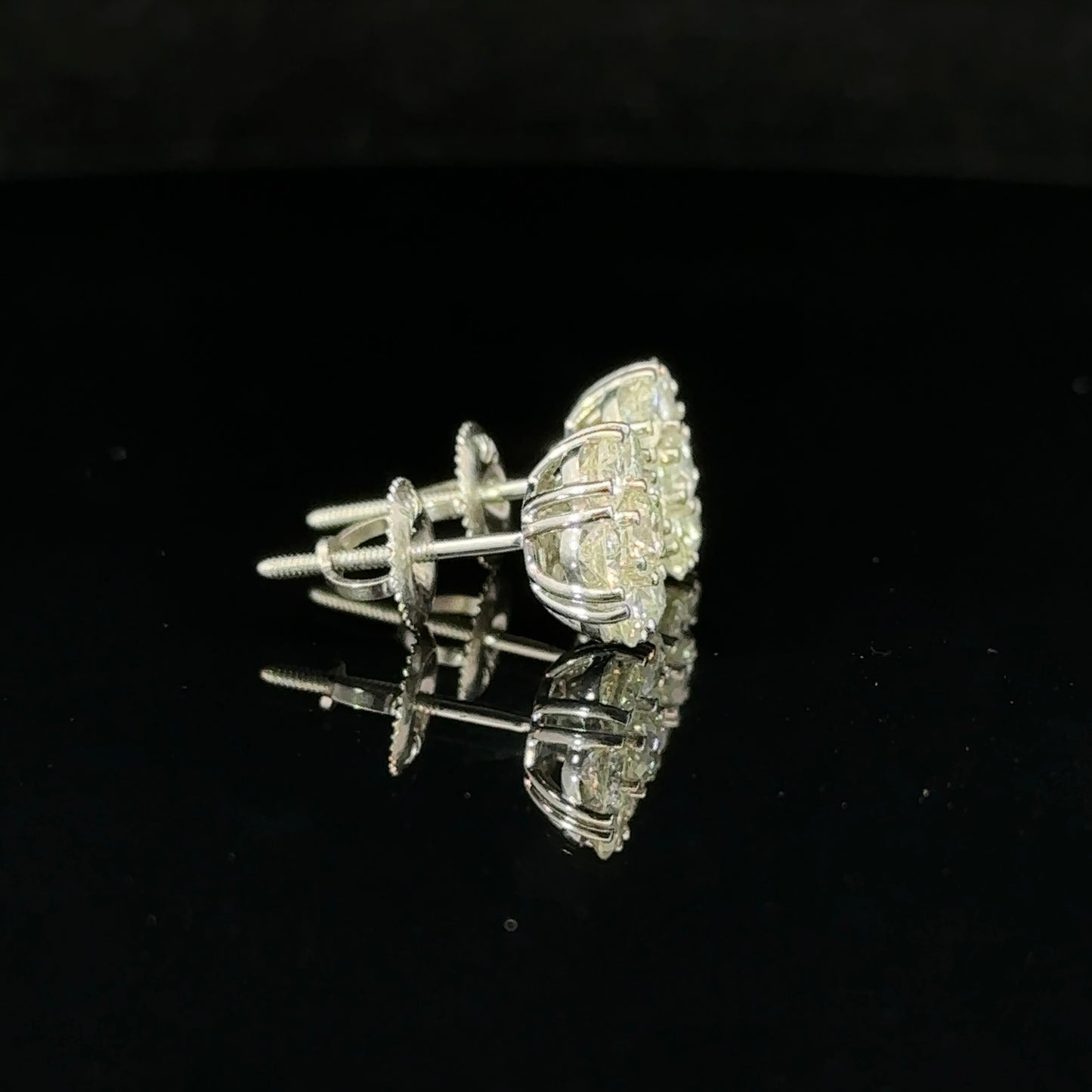 14k white gold and diamond flower Earrings (12 pointer)