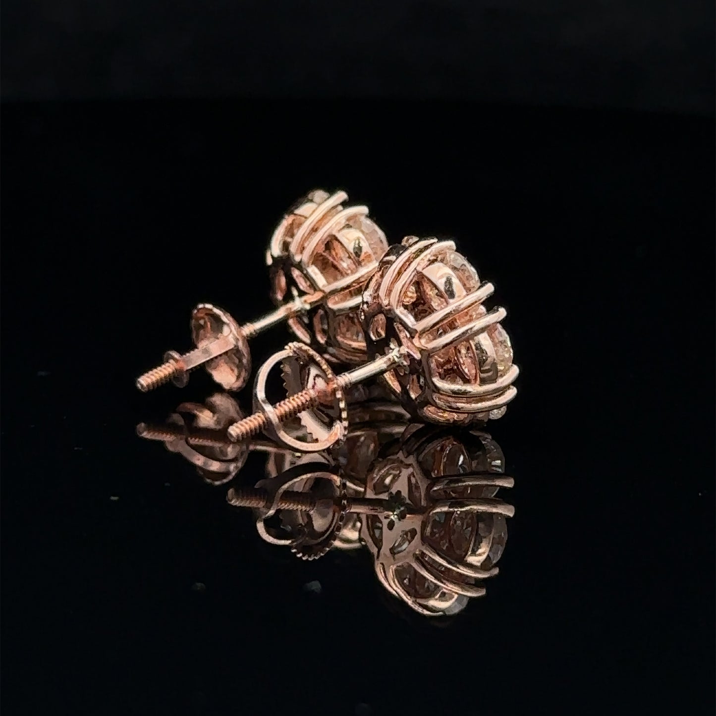 14k rose gold and diamond flower Earrings (20 pointer)