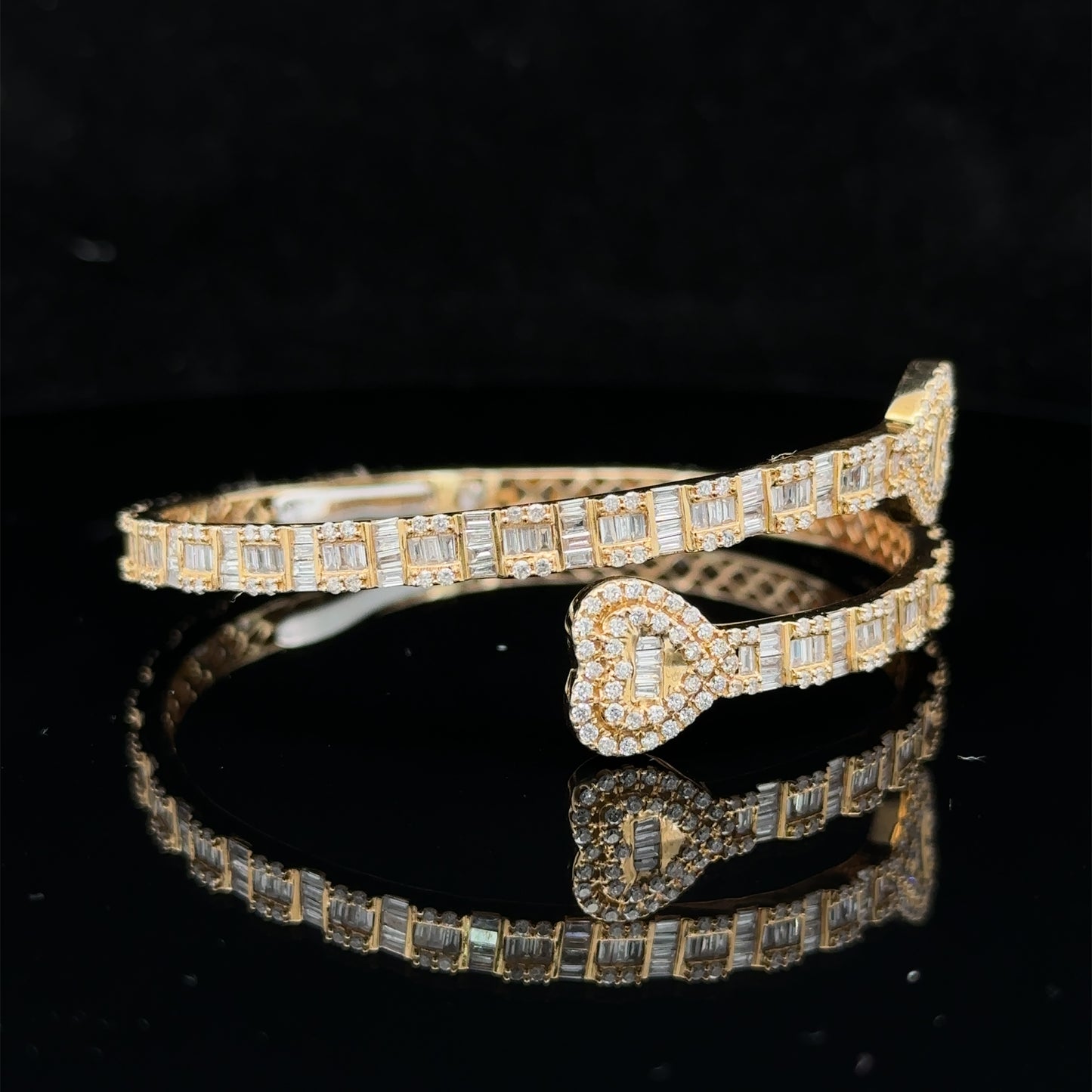 14k yellow gold and diamond twin heart bangle