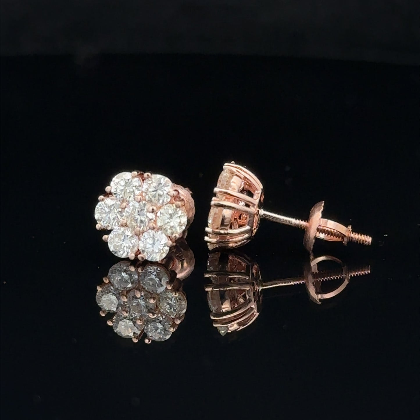 14k rose gold and diamond flower Earrings (12 pointer)