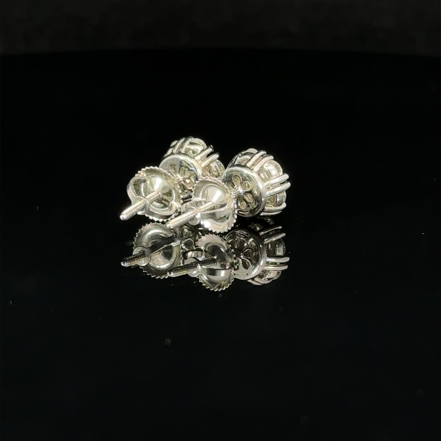 14k white gold and diamond flower Earrings (7 pointer)