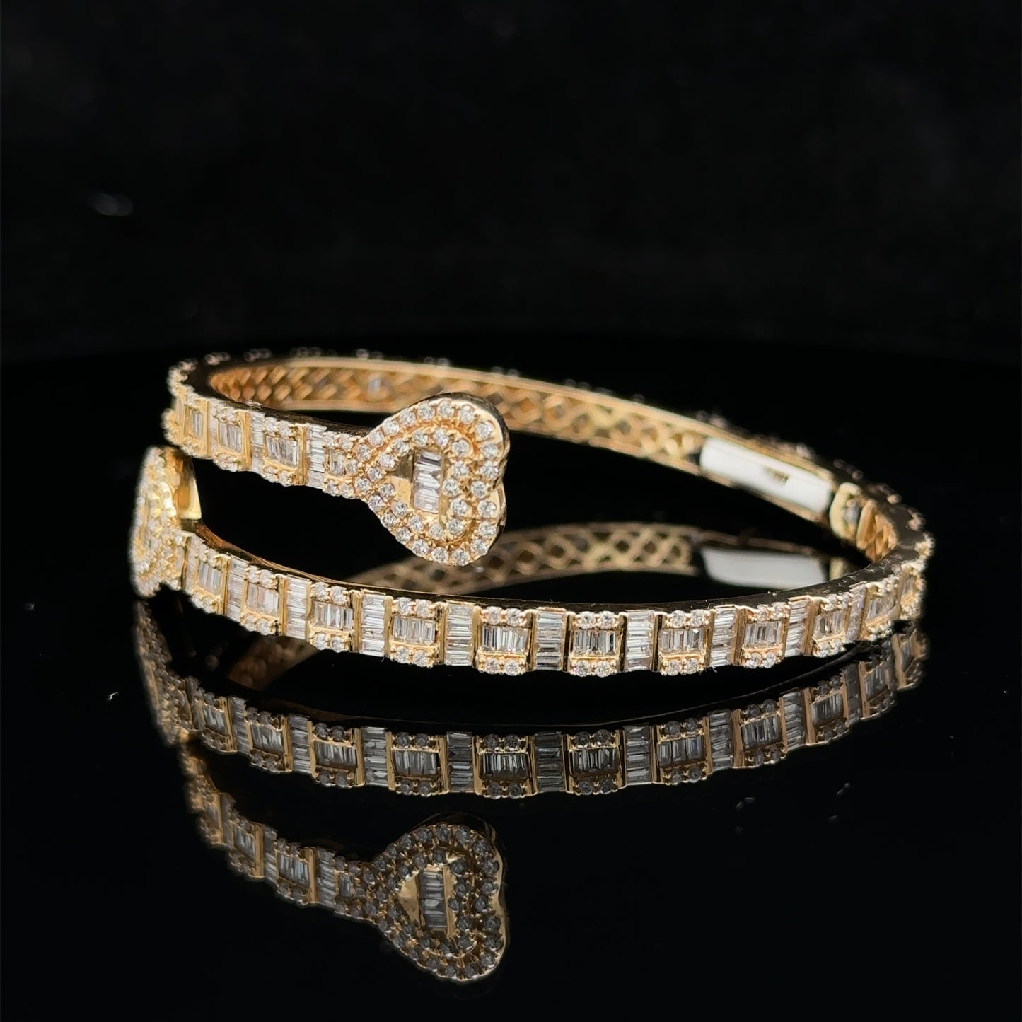 14k yellow gold and diamond twin heart bangle