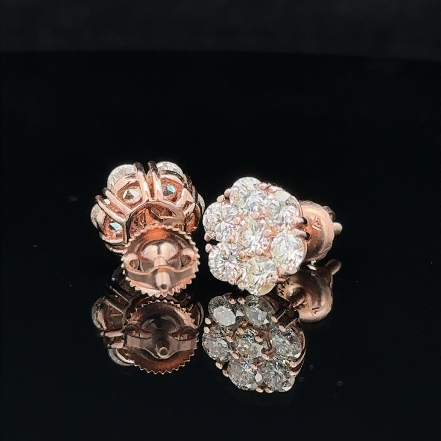 14k rose gold and diamond flower Earrings (13 pointer)