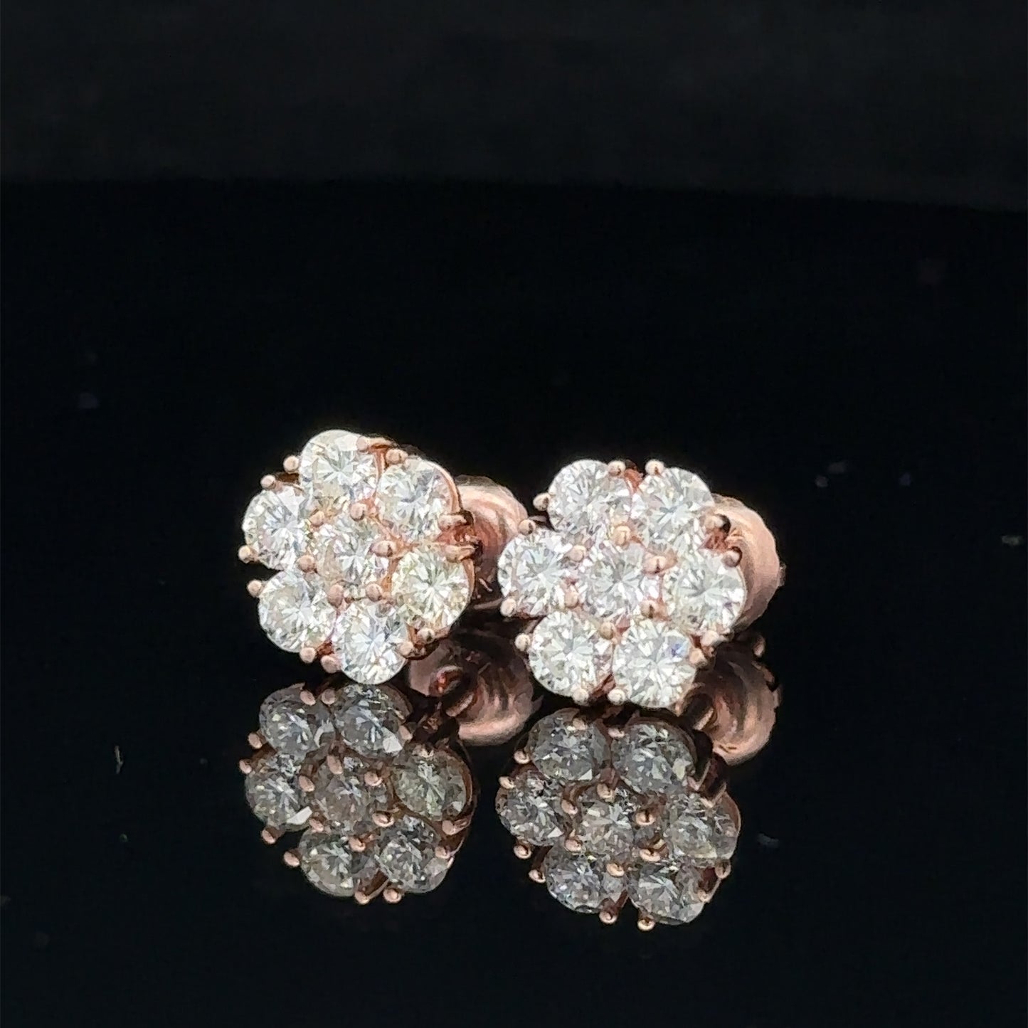 14k rose gold and diamond flower Earrings (12 pointer)