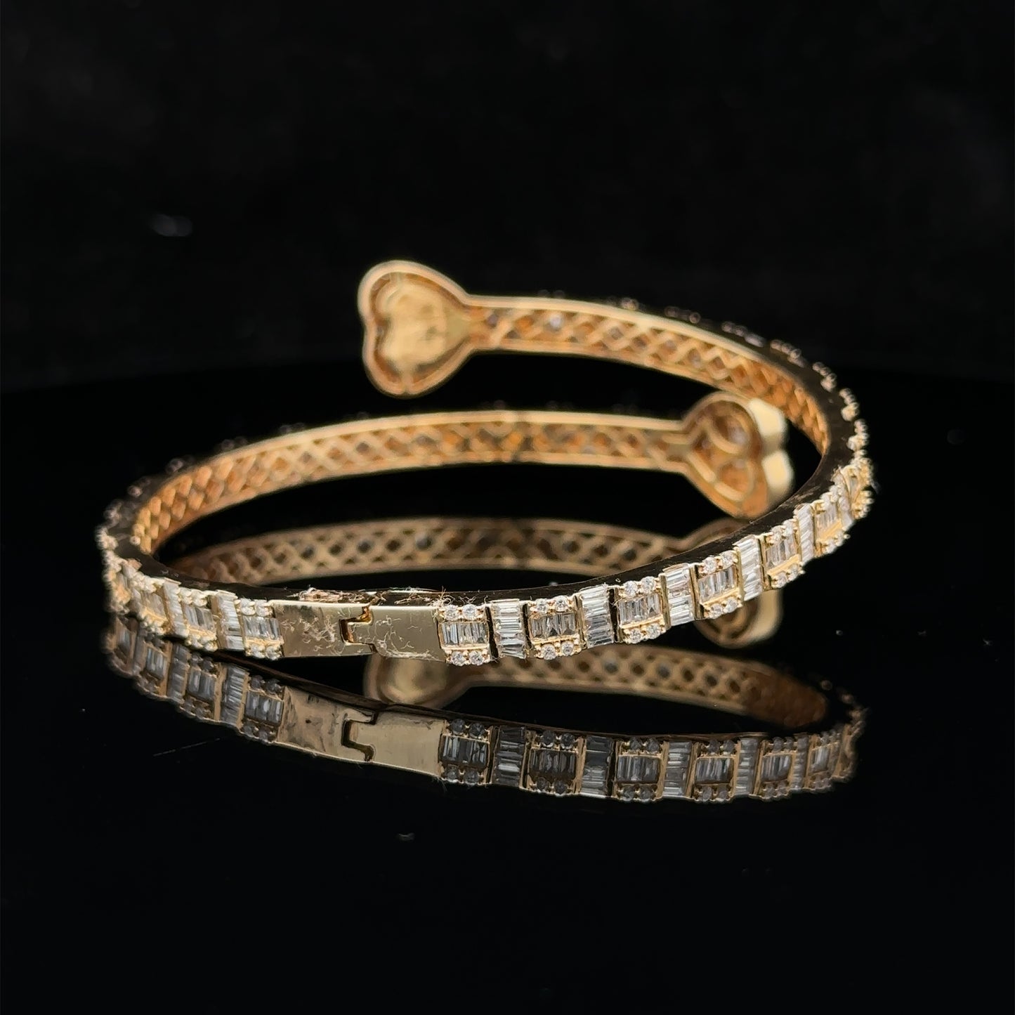 14k yellow gold and diamond twin heart bangle