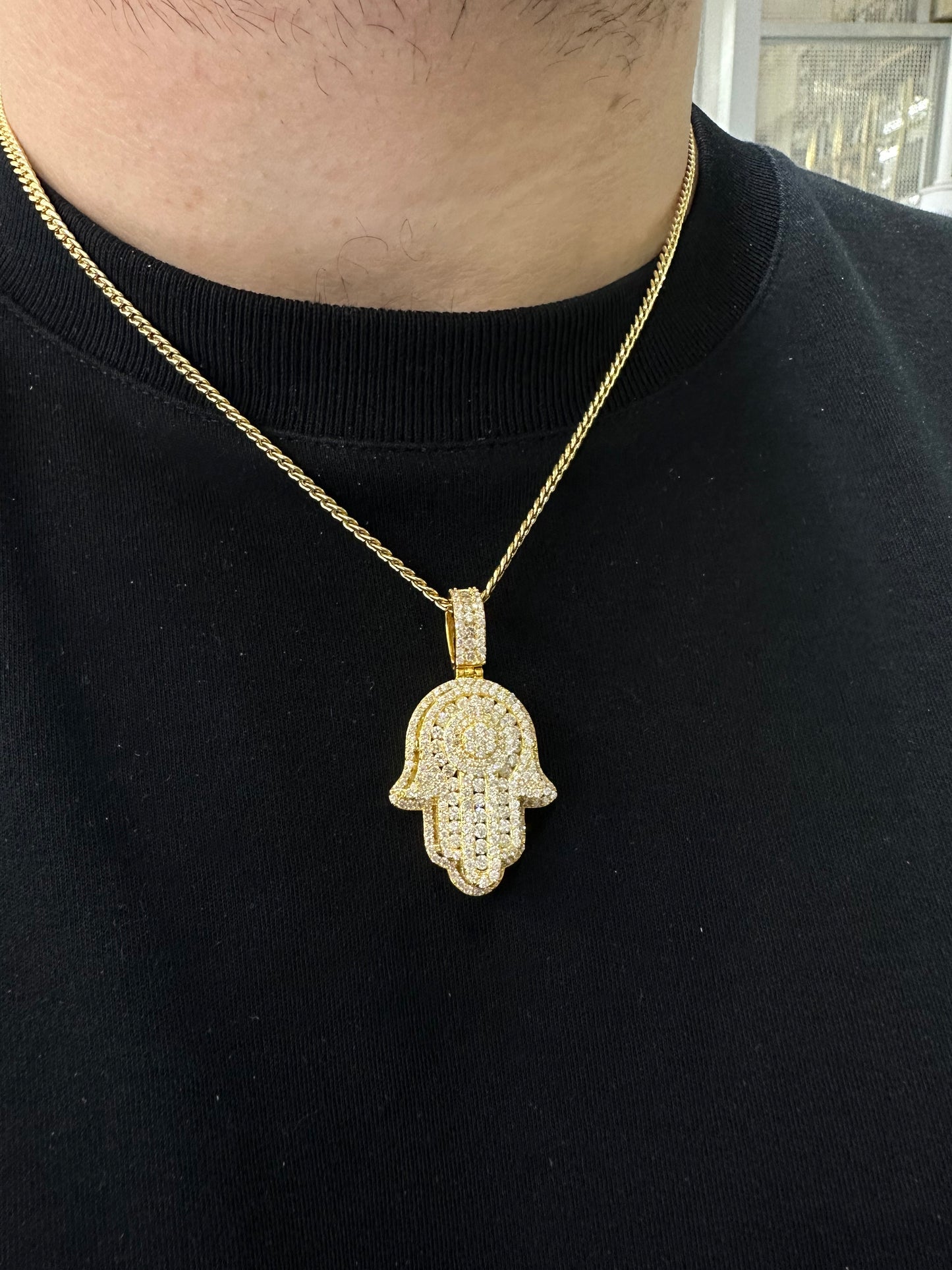 14k yellow gold and diamond Hamsa pendant and 14k yellow gold cuban link chain