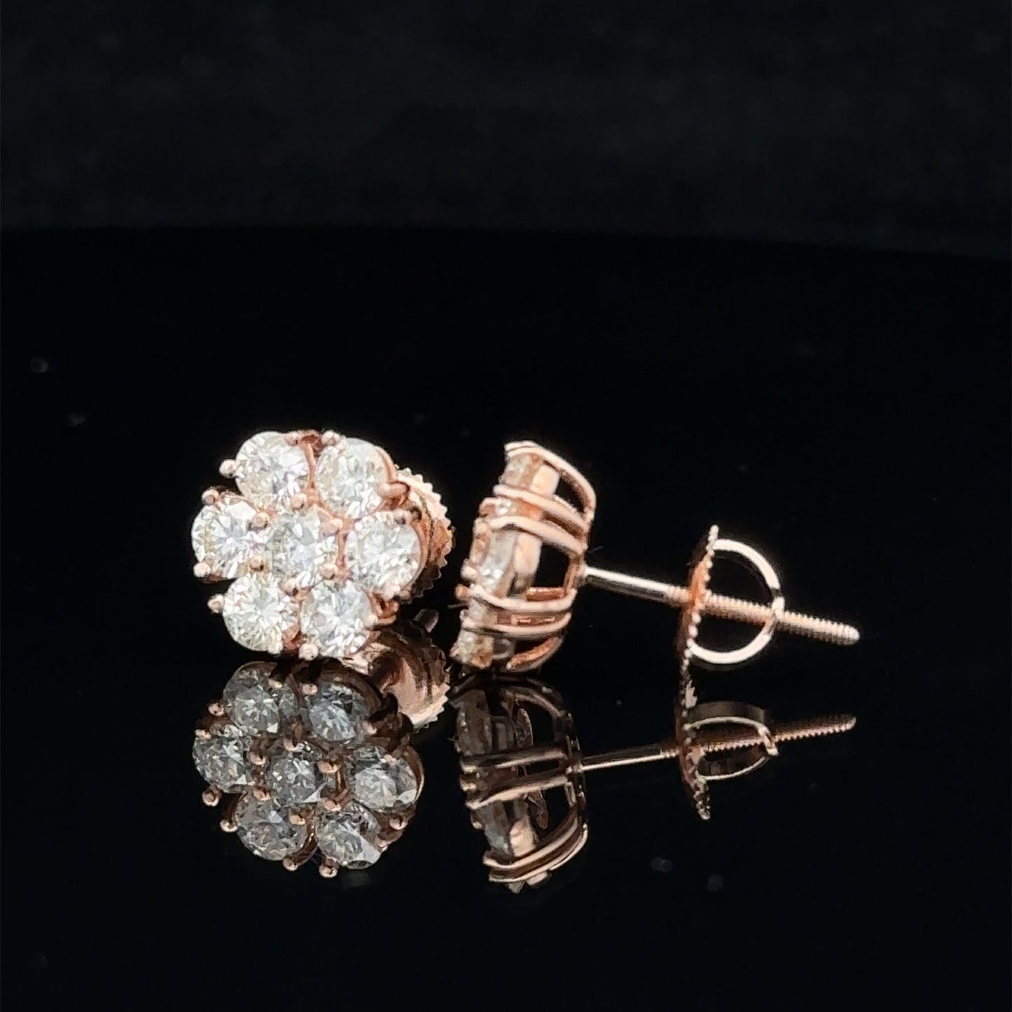 14k rose gold and diamond flower Earrings (14 pointer)