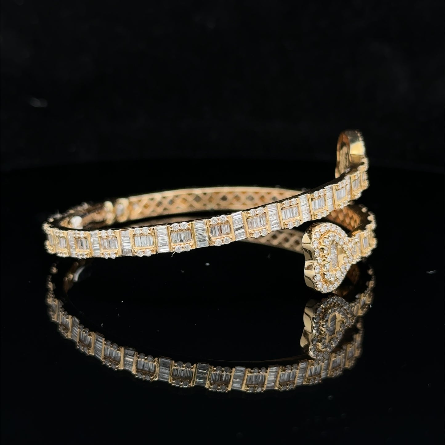 14k yellow gold and diamond twin heart bangle