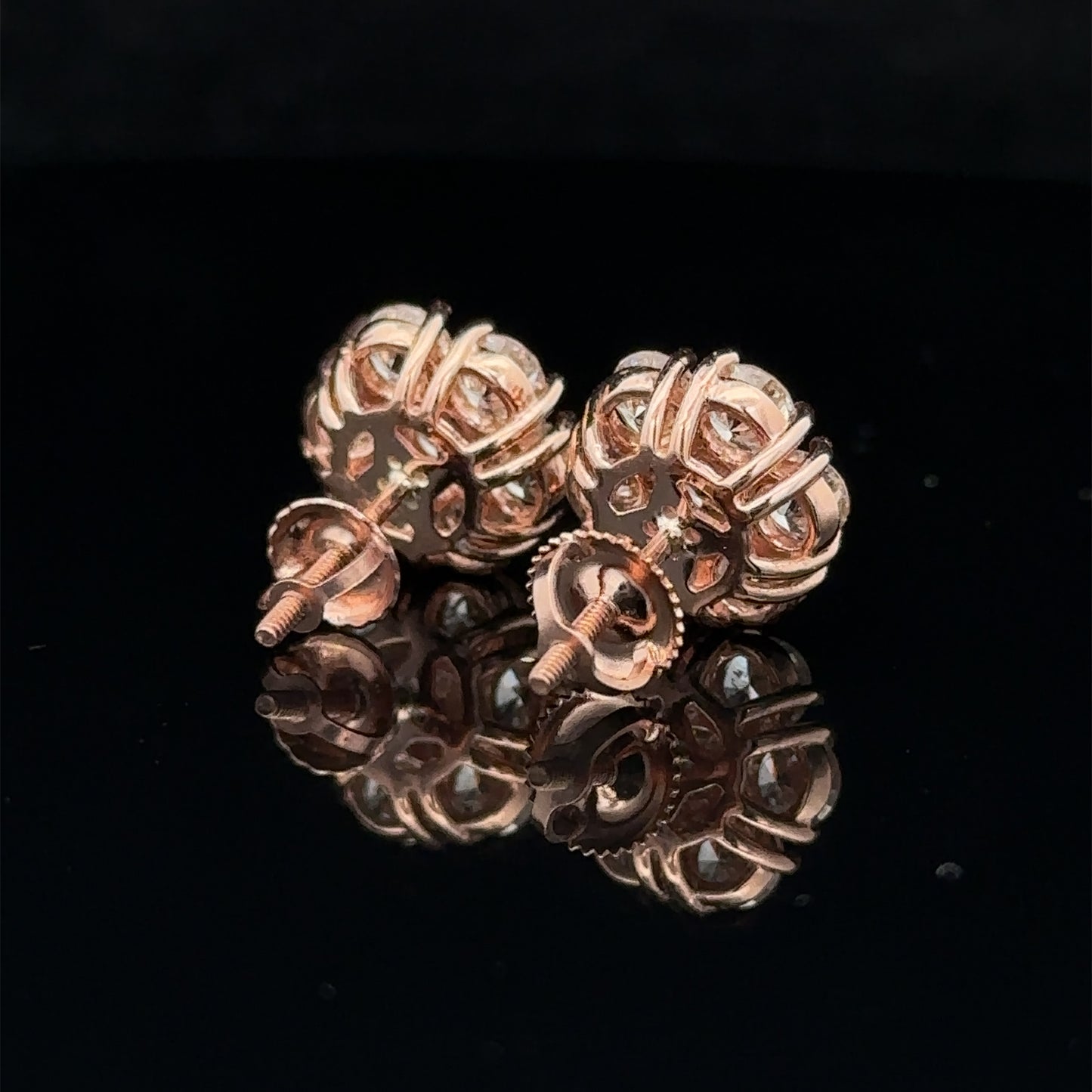 14k rose gold and diamond flower Earrings (20 pointer)