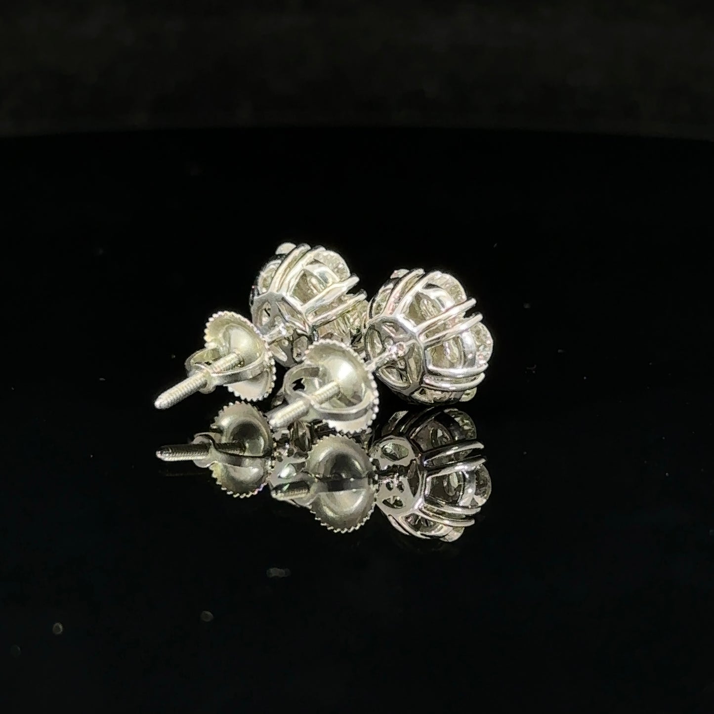 14k white gold and diamond flower Earrings (12 pointer)