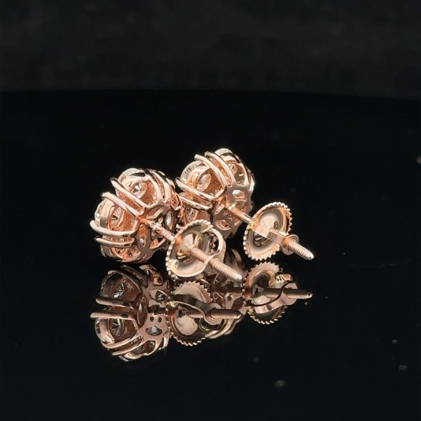 14k rose gold and diamond flower Earrings (14 pointer)