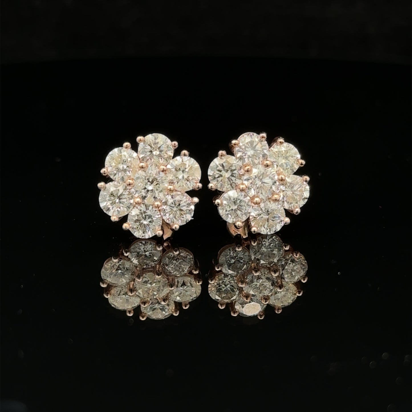 14k rose gold and diamond Earrings (25 pointer)