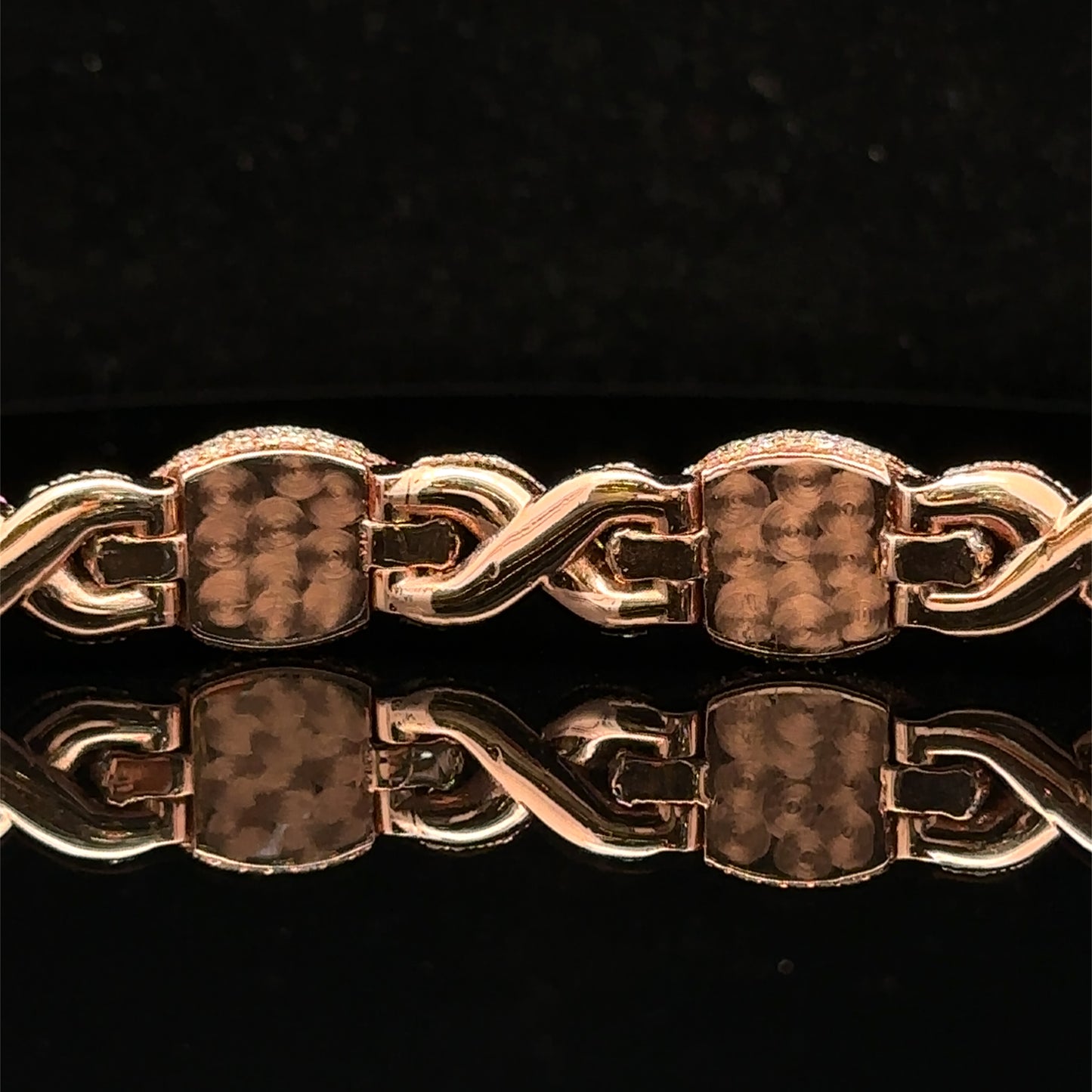 Rose Gold and Diamond Evil Eye Bracelet with round diamonds and pink stones