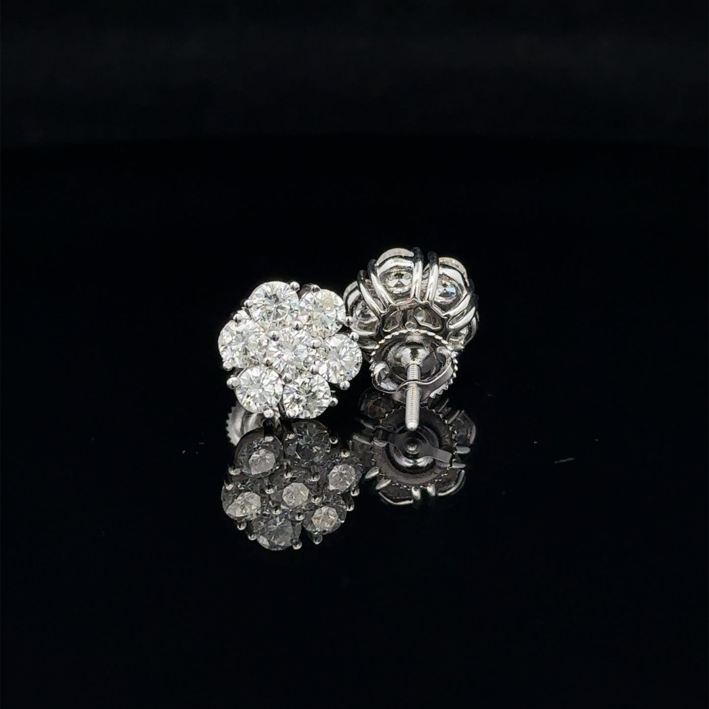 14k white gold and diamond flower Earrings (14 pointer)